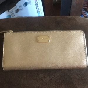 Authentic Michael Kors gold wallet